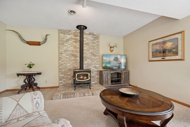 2771 County Line Ave, Osceola, WI 54020 - living room with a wood stove and a textured ceiling