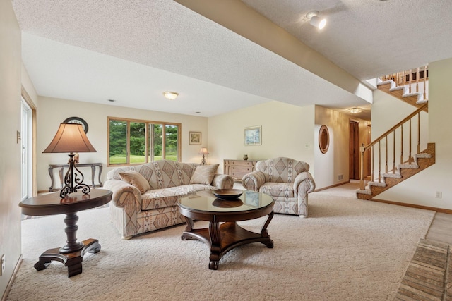 2771 County Line Ave, Osceola, WI 54020 - living room featuring carpet, stairway, and a textured ceiling