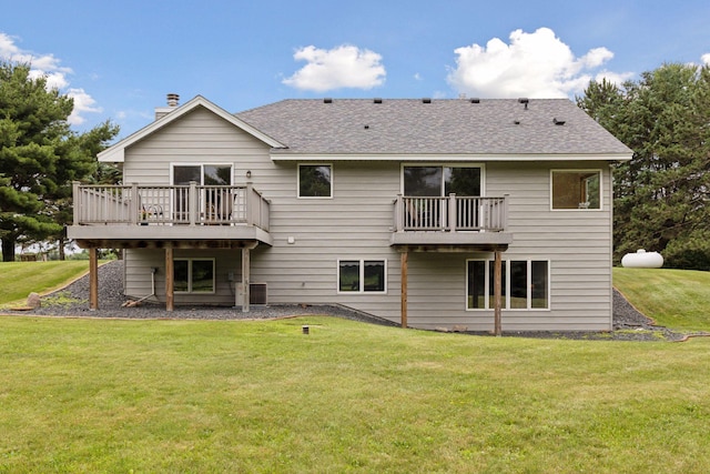 2771 County Line Ave, Osceola, WI 54020 - rear view of house featuring a yard, roof with shingles, a chimney, and a deck