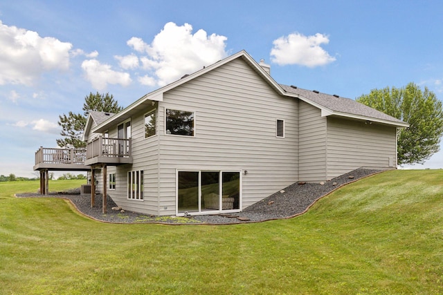 2771 County Line Ave, Osceola, WI 54020 - back of house featuring a deck and a lawn