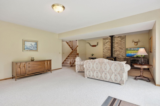 2771 County Line Ave, Osceola, WI 54020 - living area featuring carpet floors, a wood stove, and stairs