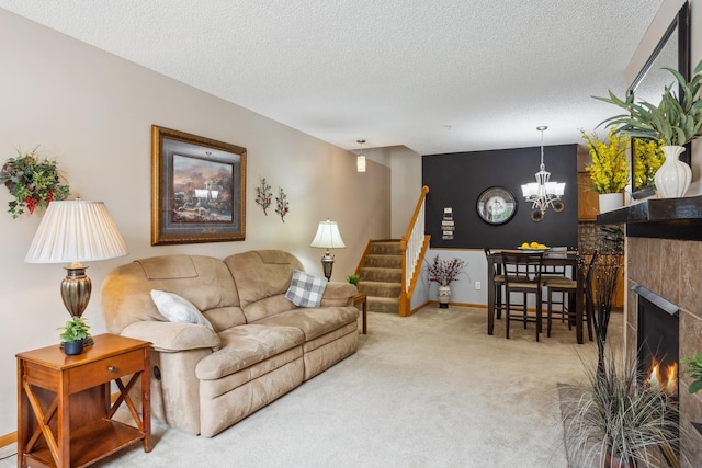 3307 Coleshire Path Unit 14, Rosemount, MN 55068 - living area featuring a chandelier, carpet, stairway, and a textured ceiling