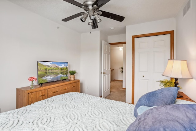 3307 Coleshire Path Unit 14, Rosemount, MN 55068 - bedroom featuring carpet flooring, a closet, and a ceiling fan