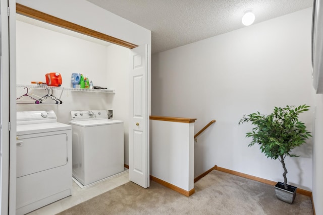 3307 Coleshire Path Unit 14, Rosemount, MN 55068 - laundry area with independent washer and dryer, light carpet, and a textured ceiling