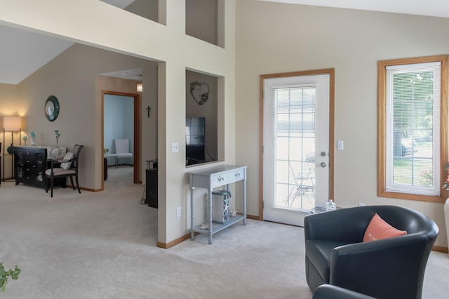 18566 Gladstone Blvd N, Maple Grove, MN 55311 - living room with carpet flooring, lofted ceiling, and plenty of natural light