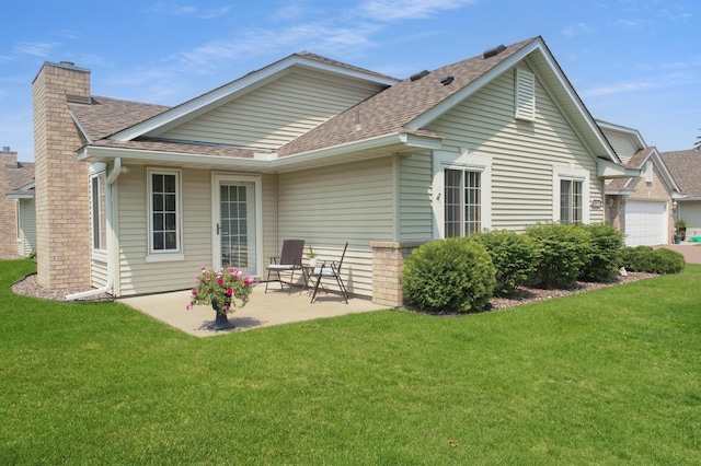 18566 Gladstone Blvd N, Maple Grove, MN 55311 - rear view of property featuring a shingled roof, a chimney, and a lawn