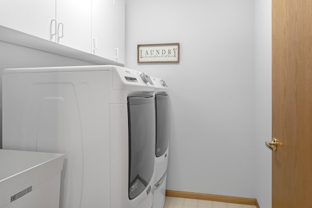 18566 Gladstone Blvd N, Maple Grove, MN 55311 - laundry room with washing machine and dryer and cabinet space