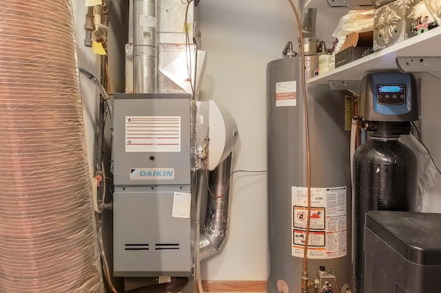 18566 Gladstone Blvd N, Maple Grove, MN 55311 - utility room with gas water heater and heating unit