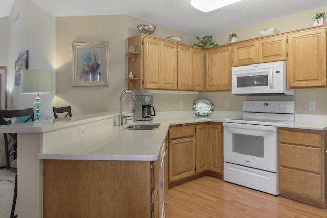 18566 Gladstone Blvd N, Maple Grove, MN 55311 - kitchen with white appliances, light wood-type flooring, a peninsula, light countertops, and open shelves