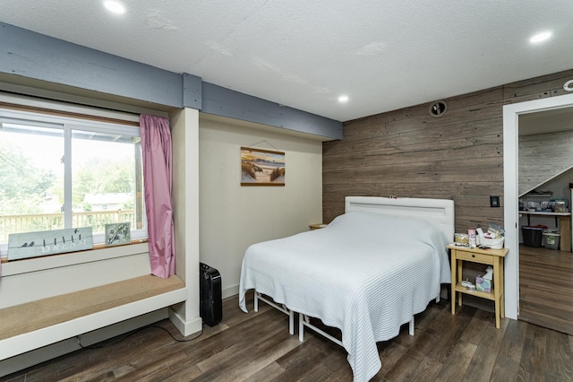 510 24th St SW, Rochester, MN 55902 - bedroom with wooden walls, recessed lighting, and wood finished floors