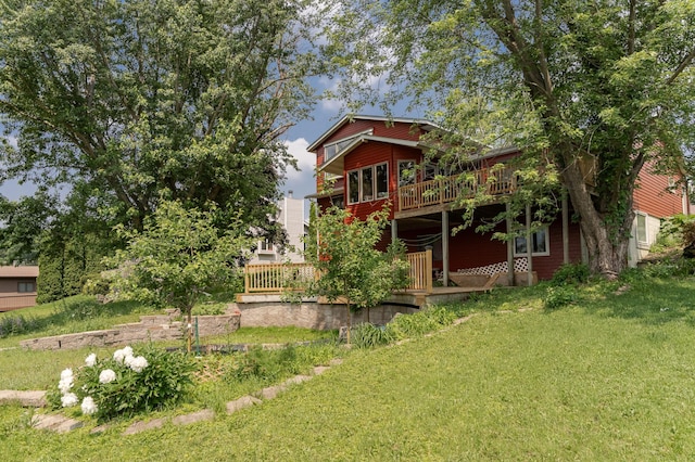 510 24th St SW, Rochester, MN 55902 - rear view of property with a deck and a lawn