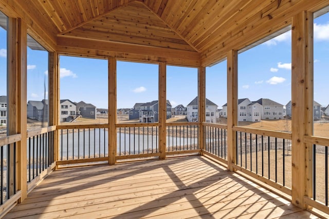 10180 Shadyview Ln N, Maple Grove, MN 55311 - unfurnished sunroom with a residential view, vaulted ceiling, and a water view