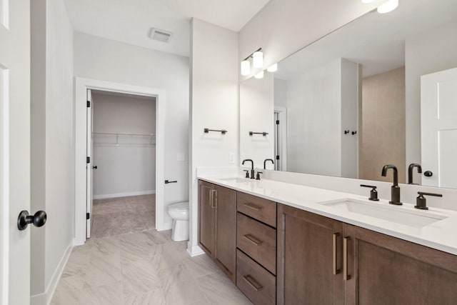 10180 Shadyview Ln N, Maple Grove, MN 55311 - full bathroom with double vanity, marble finish flooring, and a spacious closet