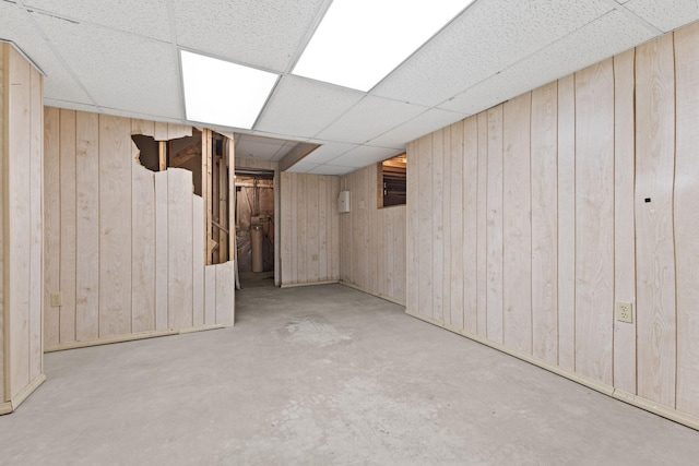 17865 Fillmore St NE, Ham Lake, MN 55304 - finished basement featuring wooden walls and a paneled ceiling
