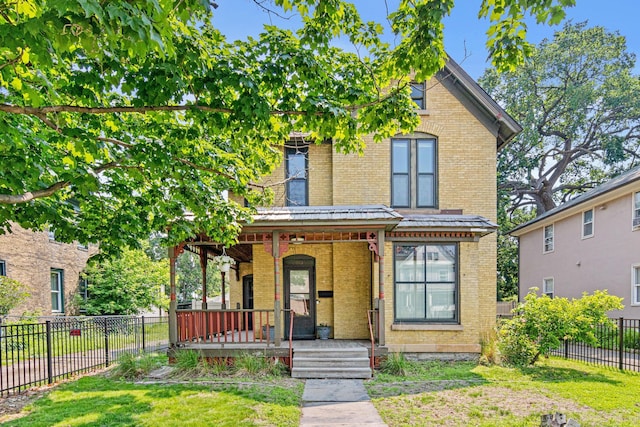 1813 11th Ave S, Minneapolis, MN 55404 - view of front of property featuring brick siding and covered porch