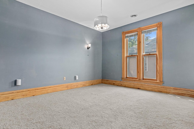1813 11th Ave S, Minneapolis, MN 55404 - empty room featuring carpet and baseboards