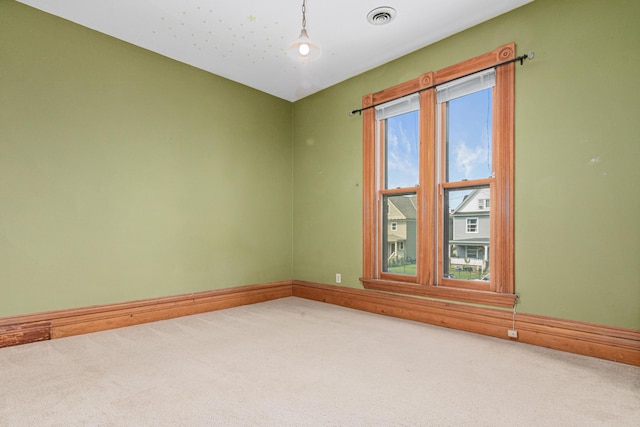 1813 11th Ave S, Minneapolis, MN 55404 - carpeted spare room featuring baseboards
