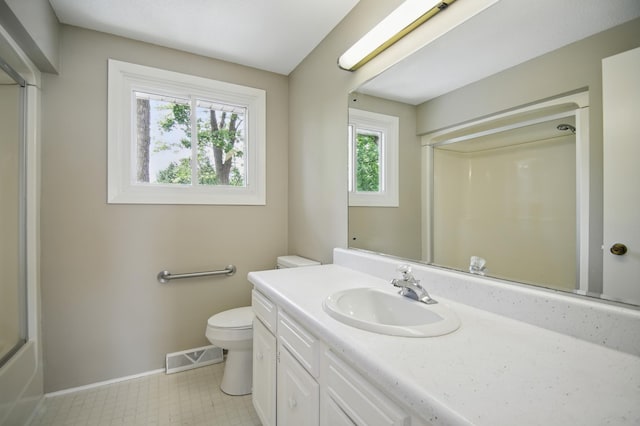 455 Sylvan St, Owatonna, MN 55060 - full bathroom featuring a shower with door and vanity