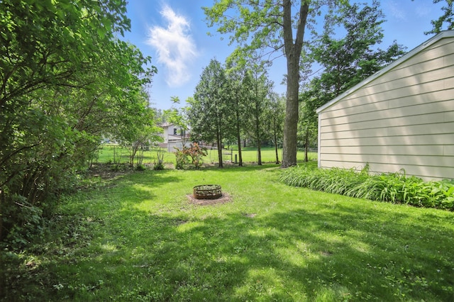455 Sylvan St, Owatonna, MN 55060 - view of yard featuring a fire pit