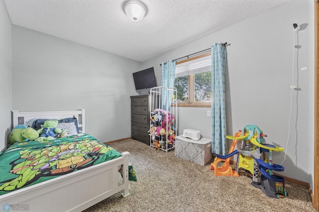 3034 18th St S, Fargo, ND 58103 - bedroom with carpet floors and a textured ceiling