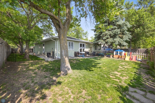 3034 18th St S, Fargo, ND 58103 - fenced backyard with a patio