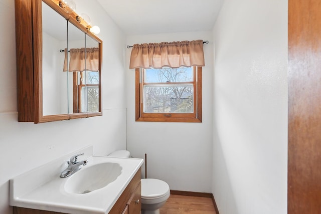 1115 3rd St NW, Faribault, MN 55021 - bathroom with vanity and wood finished floors