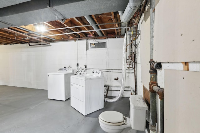 1115 3rd St NW, Faribault, MN 55021 - laundry room featuring independent washer and dryer and concrete block wall