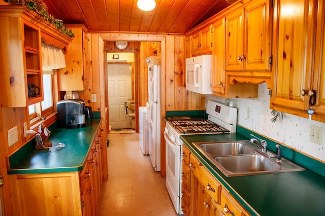 29042 County Road 4, Breezy Point, MN 56472 - kitchen featuring white appliances, wood ceiling, and brown cabinets