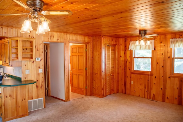 29042 County Road 4, Breezy Point, MN 56472 - kitchen with ceiling fan, light colored carpet, wooden walls, and wood ceiling