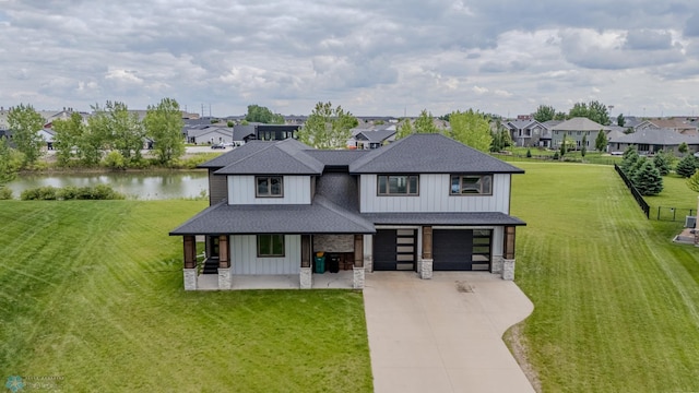 3405 4th St E, West Fargo, ND 58078 - view of front of home featuring a shingled roof, a porch, concrete driveway, and a residential view
