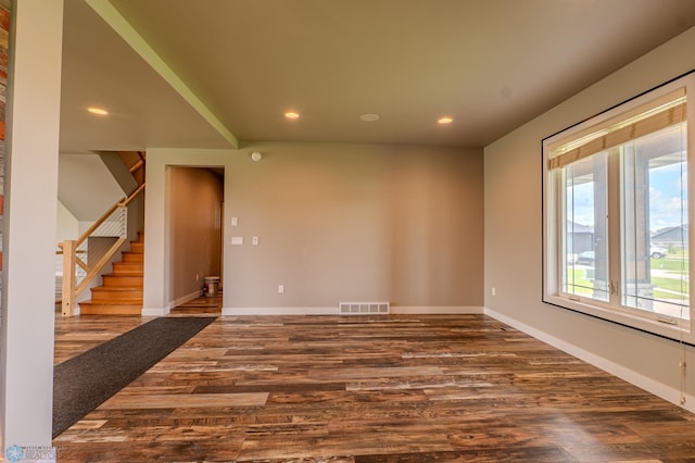 3405 4th St E, West Fargo, ND 58078 - empty room featuring wood finished floors, recessed lighting, and stairs