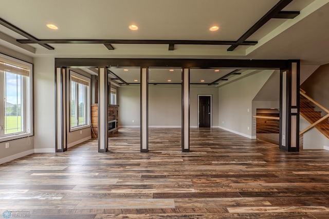 3405 4th St E, West Fargo, ND 58078 - unfurnished living room featuring stairs, dark wood-style flooring, and recessed lighting