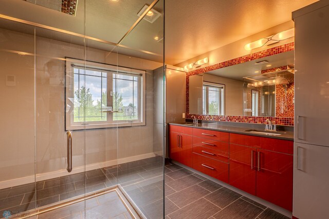 3405 4th St E, West Fargo, ND 58078 - full bath featuring double vanity, a shower with door, and tile patterned floors