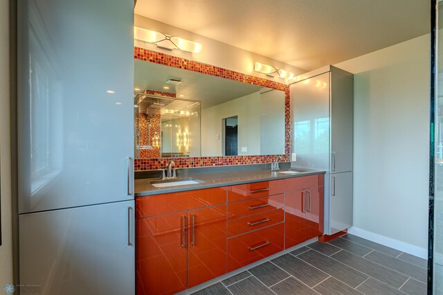 3405 4th St E, West Fargo, ND 58078 - bathroom with double vanity and decorative backsplash