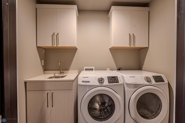 3405 4th St E, West Fargo, ND 58078 - laundry area with independent washer and dryer and cabinet space