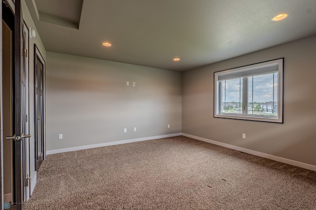3405 4th St E, West Fargo, ND 58078 - unfurnished room featuring carpet flooring and recessed lighting