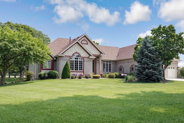 13907 Washington St NE, Ham Lake, MN 55304 - view of front of property with a front lawn and brick siding