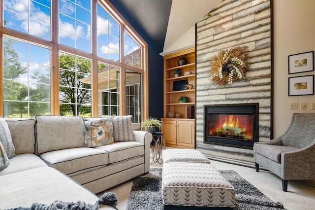13907 Washington St NE, Ham Lake, MN 55304 - living area with a glass covered fireplace and high vaulted ceiling