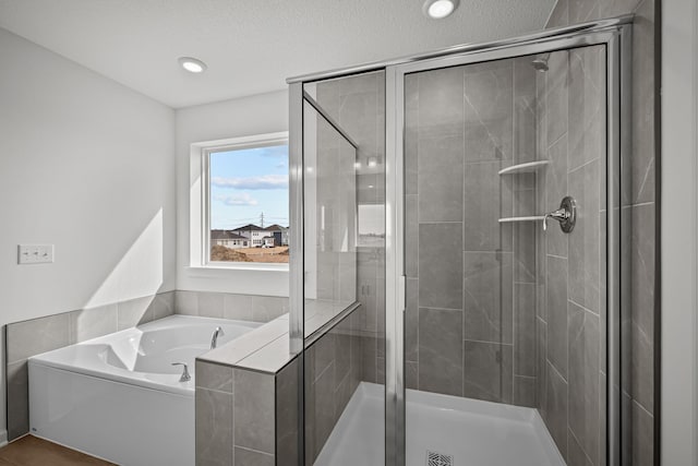 11532 Polaris Ln N, Dayton, MN 55369 - bathroom featuring a bath and a shower stall