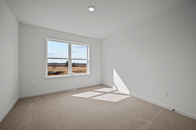 11532 Polaris Ln N, Dayton, MN 55369 - spare room featuring light carpet and baseboards