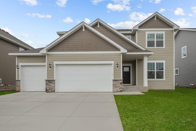 15920 116th Ave N, Dayton, MN 55369 - craftsman inspired home featuring concrete driveway, an attached garage, stone siding, and a front yard