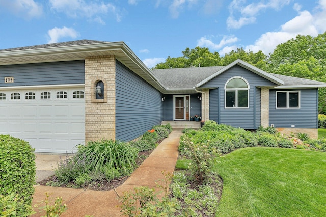 2708 Tranquility Dr, Saint Cloud, MN 56301 - ranch-style home with brick siding, a garage, a shingled roof, and a front yard