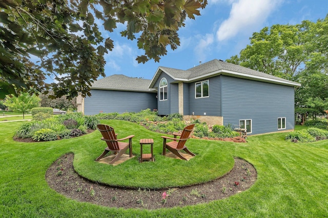2708 Tranquility Dr, Saint Cloud, MN 56301 - back of property featuring a lawn
