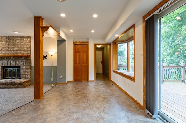 14500 Raleigh Ave, Savage, MN 55378 - entrance foyer featuring a brick fireplace and recessed lighting