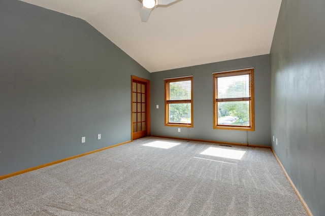 14500 Raleigh Ave, Savage, MN 55378 - carpeted spare room featuring vaulted ceiling and ceiling fan
