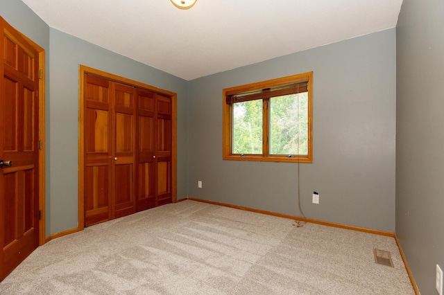 14500 Raleigh Ave, Savage, MN 55378 - unfurnished bedroom with carpet flooring and a closet