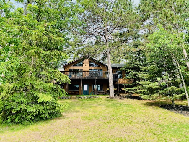 N14220 Island View Rd, Minong, WI 54859 - rear view of property with a deck and a yard