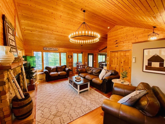 N14220 Island View Rd, Minong, WI 54859 - living area with vaulted ceiling, wooden ceiling, wooden walls, a chandelier, and wood finished floors