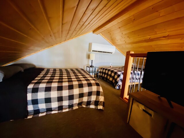 N14220 Island View Rd, Minong, WI 54859 - carpeted bedroom featuring a wall unit AC, lofted ceiling, and wood ceiling