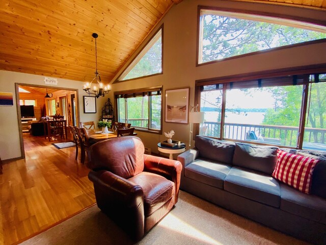 N14220 Island View Rd, Minong, WI 54859 - living room featuring a chandelier, wood ceiling, high vaulted ceiling, and light wood finished floors